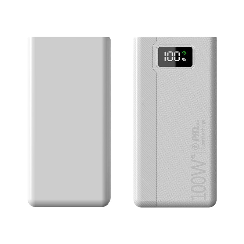 The picture shows a light - gray portable power bank with a digital display indicating 100% charge on one side.
