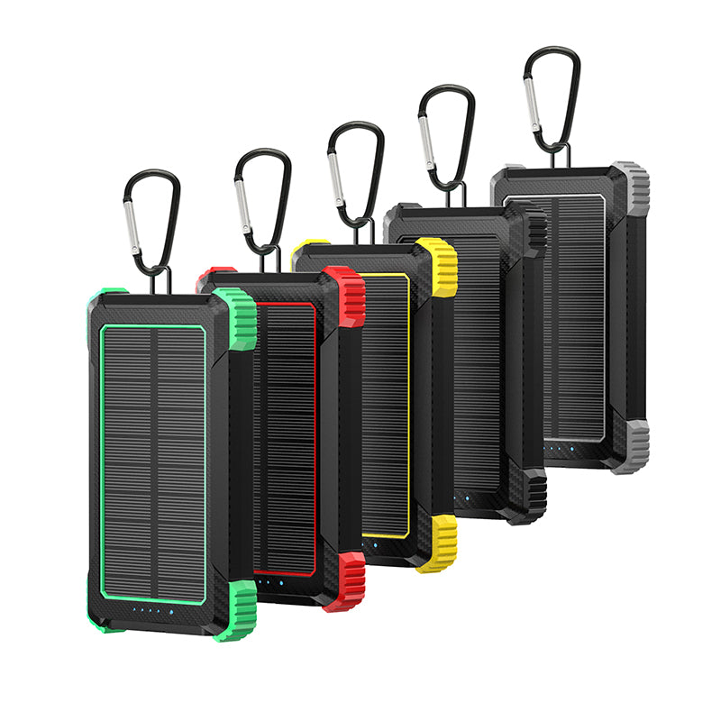 The picture shows four portable power banks with rugged designs, each featuring a carabiner hook on top, solar panels, and colorful accents (green, red, yellow, and gray).
