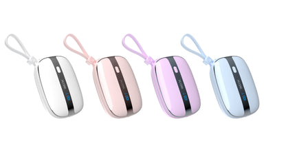 The picture shows four portable power banks with different pastel - colored shells and attached lanyards, each featuring a digital display indicating battery level.
