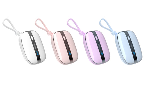 The picture shows four portable power banks with different pastel - colored shells and attached lanyards, each featuring a digital display indicating battery level.
