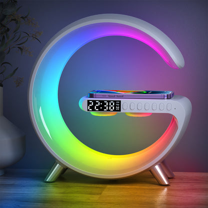 The picture shows a white multifunctional alarm clock with a circular, colorful light ring, a digital display showing the time as 22:38, and several buttons for various functions.
