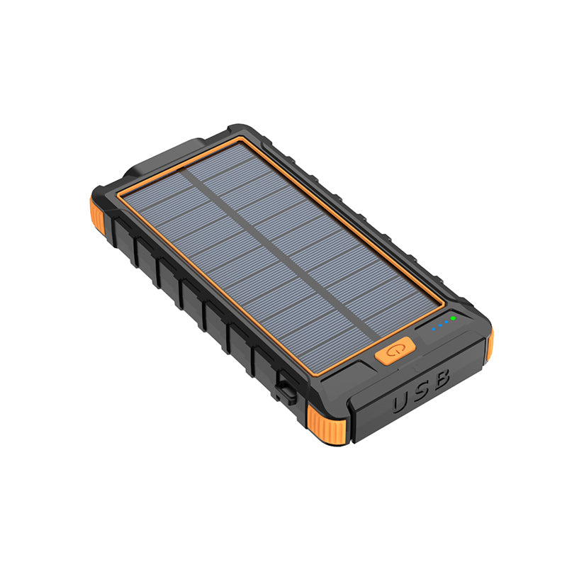 The picture shows a orange portable power bank with a solar panel on the top surface, a USB port, and indicator lights on the bottom edge.
