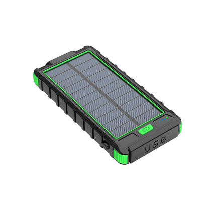 The picture shows a green portable power bank with a solar panel on the top surface, a USB port, and indicator lights on the bottom edge.
