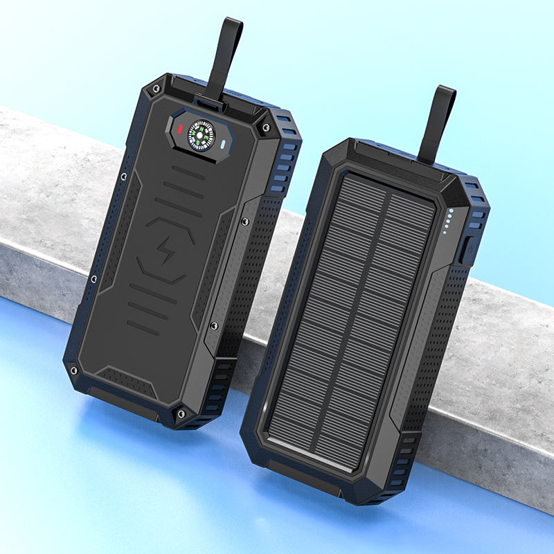 Pictured are two sturdy, portable solar power banks with a solar panel on one side and a built-in compass and indicator light on the other.