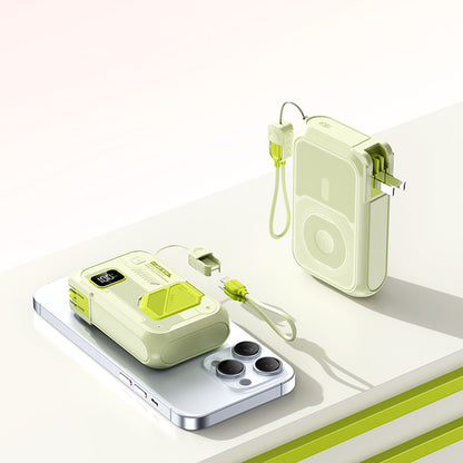 Pictured are a light-colored portable power bank with a digital display, one resting on a smartphone and another standing upright, both with built-in cables.