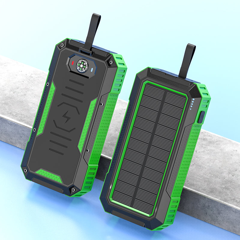 Pictured are two sturdy, portable green solar power banks with a solar panel on one side and a built-in compass and indicator light on the other.