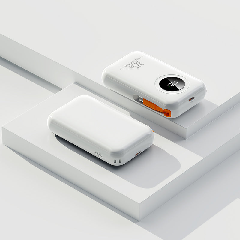 The picture shows a white mobile power bank with an orange charging port and a digital display showing "100" on one side, and no visible display on the other side.