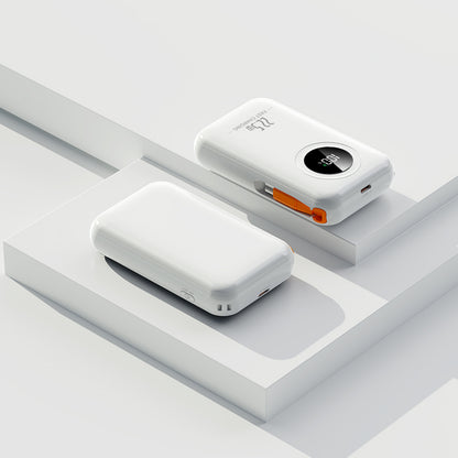 The picture shows a white mobile power bank with an orange charging port and a digital display showing "100" on one side, and no visible display on the other side.