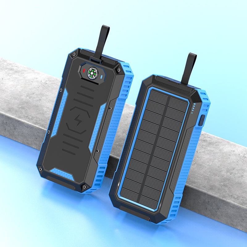 Pictured are two sturdy, portable blue solar power banks with a solar panel on one side and a built-in compass and indicator light on the other.