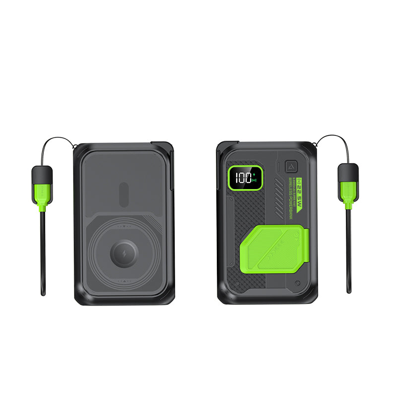 Shown in the picture is a black and green ruggedly designed portable power bank with a digital display indicating 100% battery level and a green-tipped hand strap.