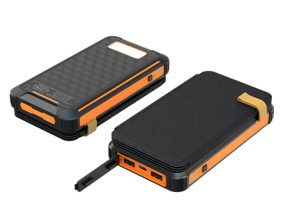 The image shows one portable power banks with rugged, black and orange exteriors, featuring multiple ports for charging, a handle for carrying, and an indicator light.