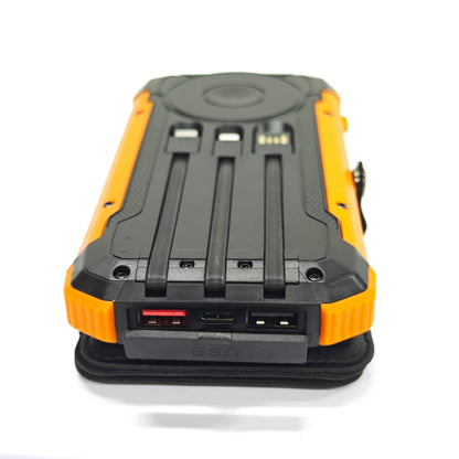 The orange solar charger has three sockets when viewed from above.