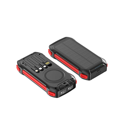 The picture shows two rugged - looking power banks with red accents; one has a solar panel on the top for charging, while the other features multiple ports including USB and a wireless charging pad on the front.
