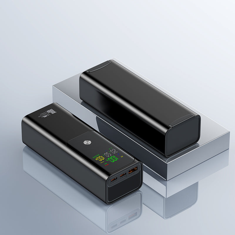 The image shows two black power banks with a very digital display, 100W capacity and the way of output can meet the multiple needs for your devise.