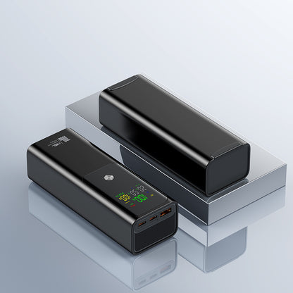 The image shows two black power banks with a very digital display, 100W capacity and the way of output can meet the multiple needs for your devise.