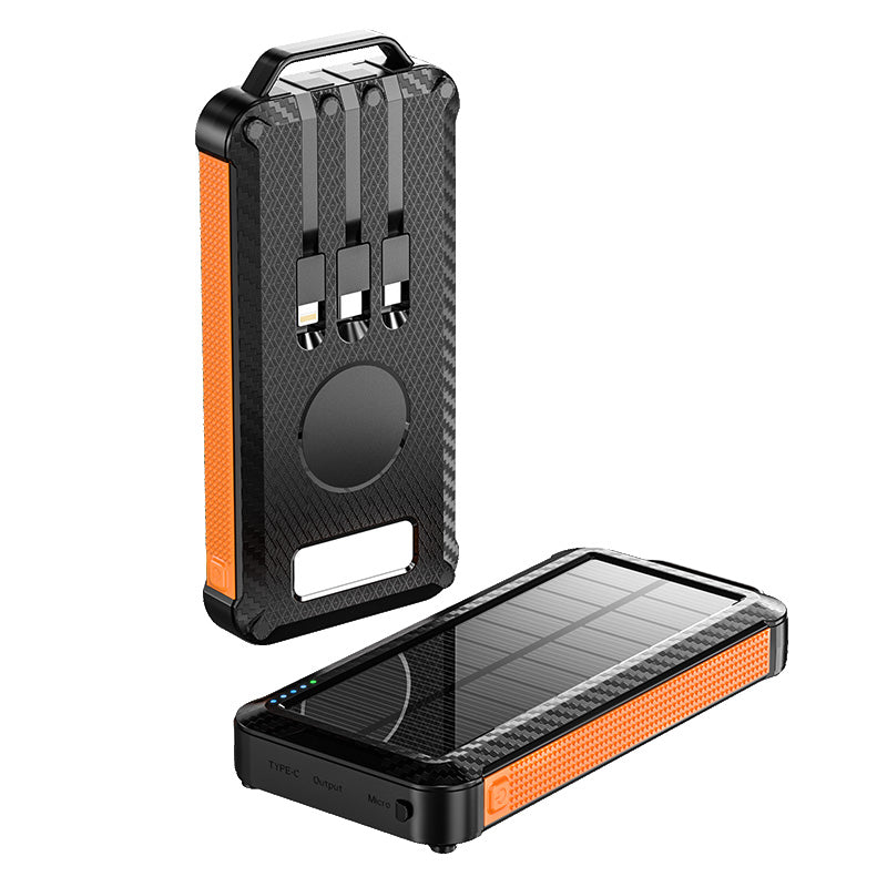 The picture shows an orangeportable solar power bank with a rugged design, featuring a solar panel on one side for charging, multiple output ports on the other side, and a handle for easy carrying.
