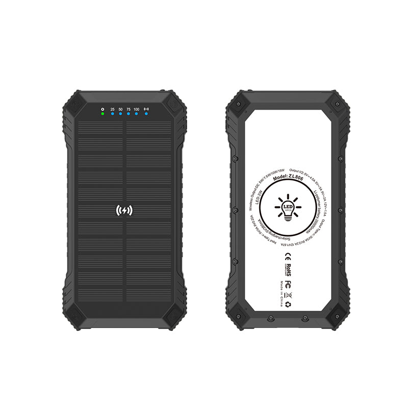 The image shows a portable black solar power bank with a rugged design, featuring a solar panel on one side and an LED indicator with multiple charging status levels on the other.