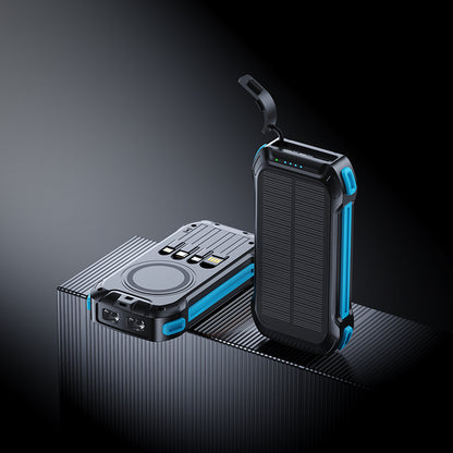 The picture shows two portable power banks with blue accents; one has a wireless charging area, multiple ports, and a solar panel, while the other features a similar design with a handle.
