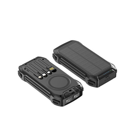 The picture shows two black portable power banks; one has solar panels on the top and multiple charging ports including USB on the side, while the other has a circular wireless charging area and various input/output ports.
