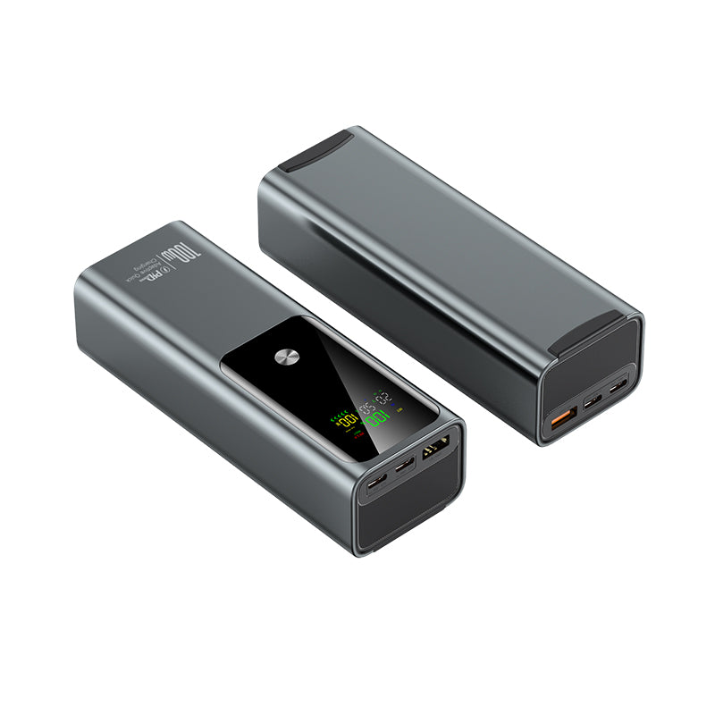 The image shows two grey power banks with a very digital display, 100W capacity and the way of output can meet the multiple needs for your devise.