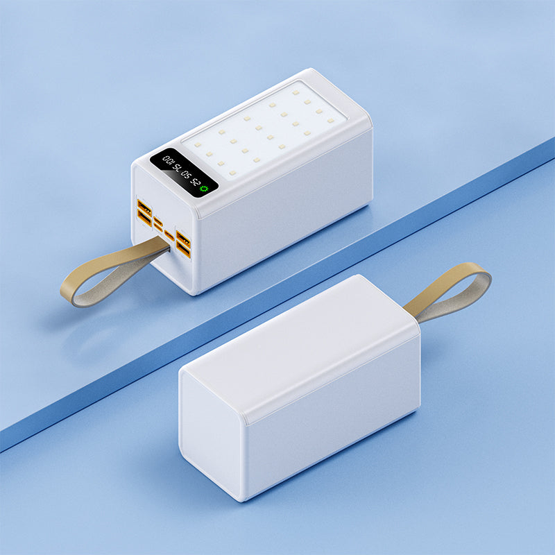 The image shows two white power banks with multiple USB ports, a digital display, and a looped strap, displayed against a blue background.