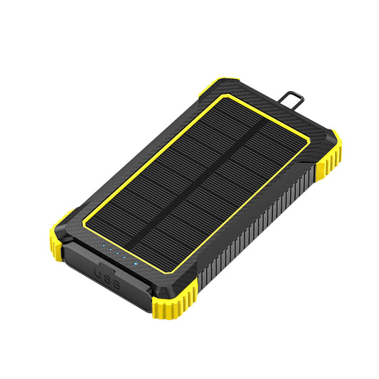 The picture shows a portable power bank with a solar panel on the top surface, featuring a rugged design with yellow and black colors, and having a USB port on the side.
