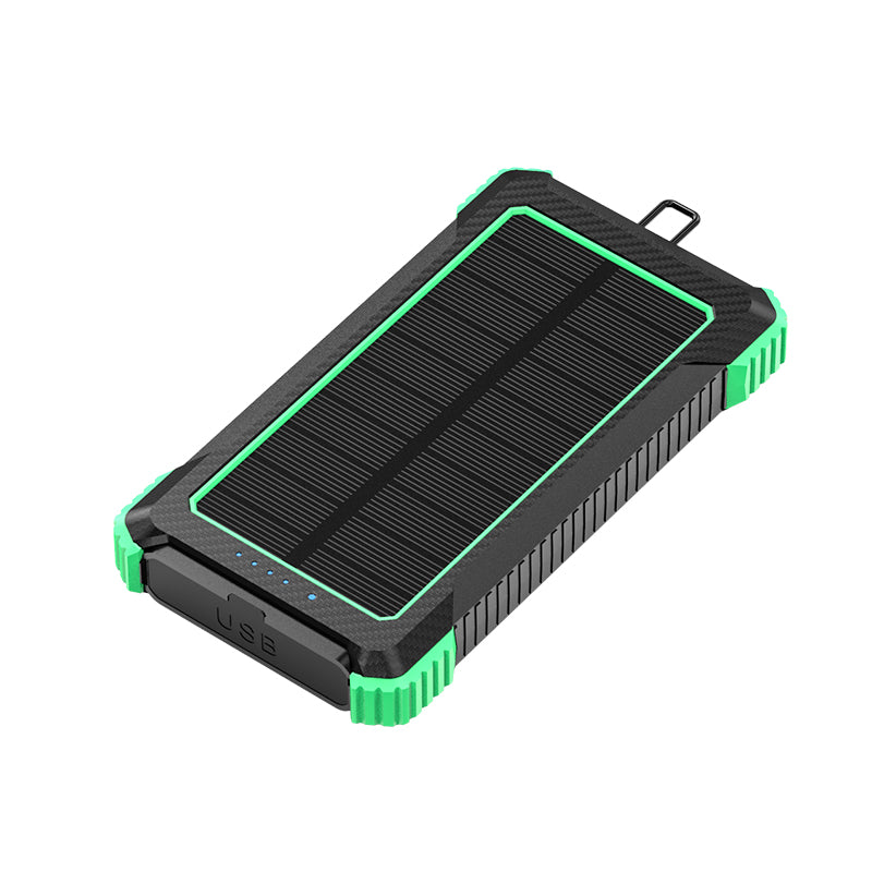 The picture shows a portable power bank with a solar panel on the top surface, featuring a rugged design with green and black colors, and having a USB port on the side.
