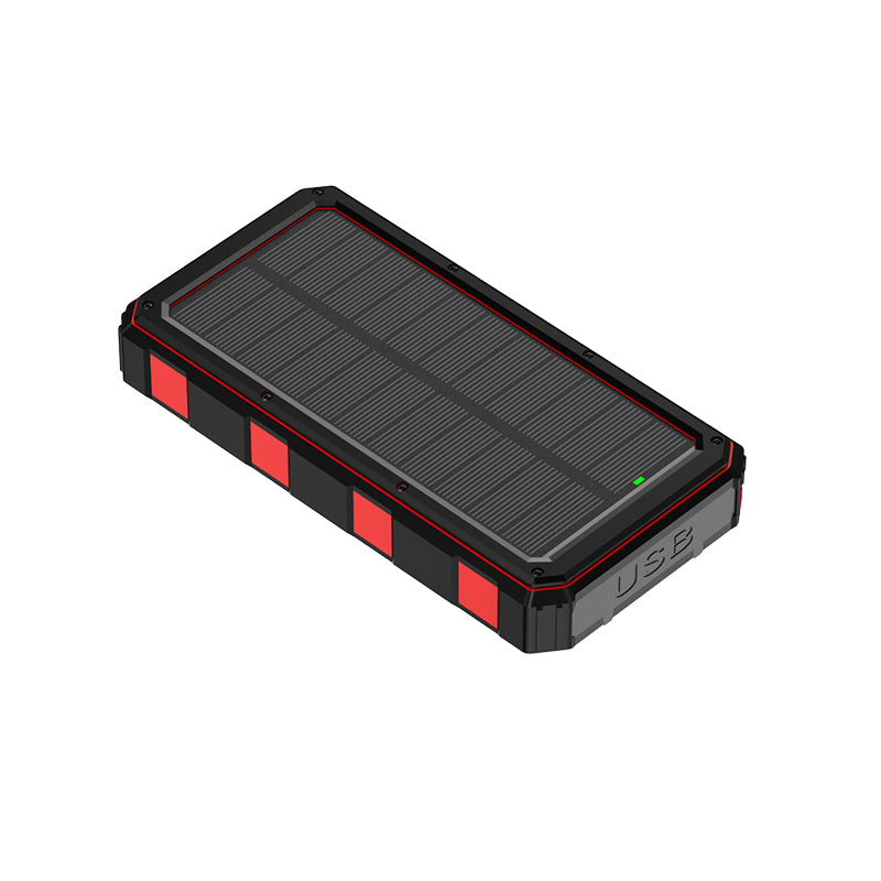 The image depicts a portable power bank with a solar panel on its top surface, featuring a black and red design, and has a USB port indicated by the text "USB" on its side.
