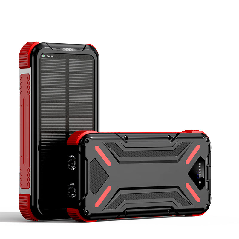 The picture shows a red portable power bank with a rugged design and a solar panel on its surface.